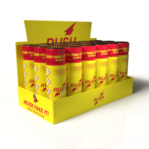 Display box of 18 Pack Rush Poppers 24ml Original, showing multiple yellow and red branded bottles neatly arranged