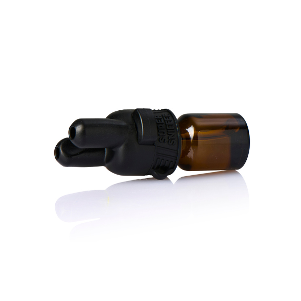 Super Sniffer V2 Black Poppers Cap on Small Bottle: A sleek and modern black Super Sniffer V2 cap, designed with dual nozzles for enhanced aroma diffusion, sitting securely on a compact amber glass bottle, perfect for portability.