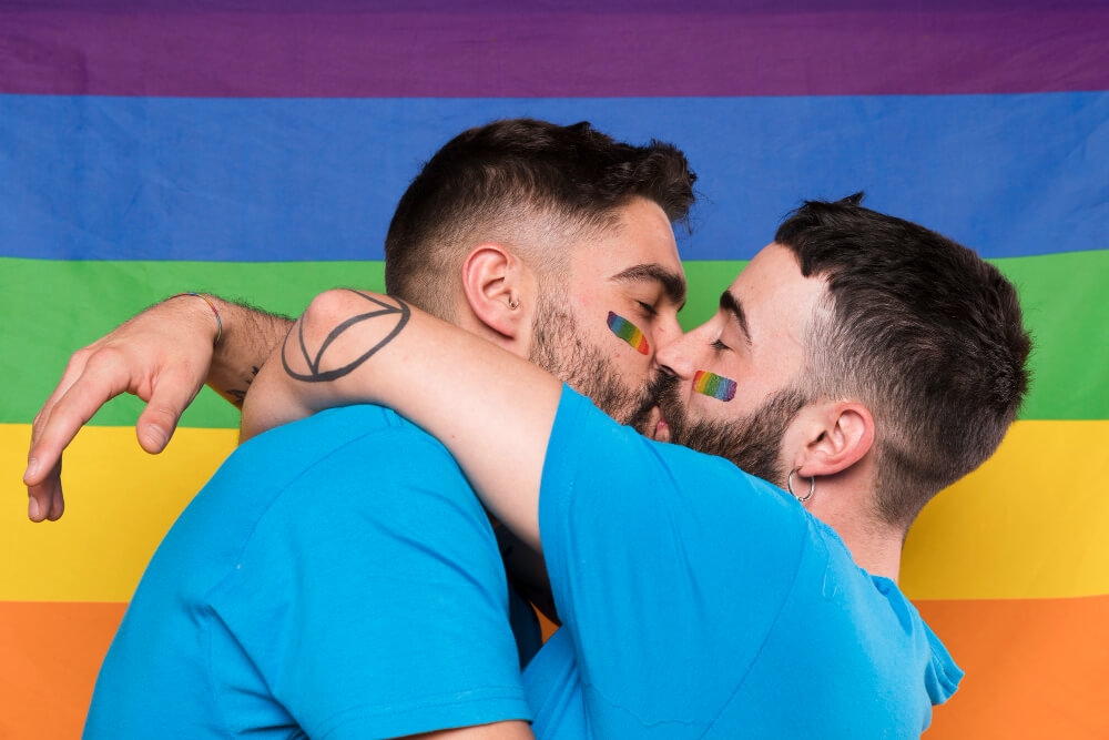 LGBTQ couple enjoying poppers as part of their celebration – find where to buy poppers in the EU